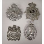 Four Victorian regimental helmet plates, viz. The Cameroonians Scottish Rifles; The Hampshire 1st