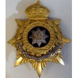 An East Surrey Regiment helmet plate  (Please Note: this lot is subject to the statement made in the