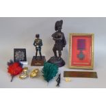 Mixed military related items: to include a replica Victoria Cross; and a painted diecast standing