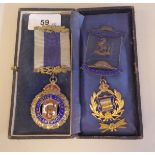 Two silver and enamel Order of Buffalo medals on ribbons