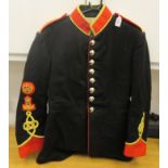 A British REME Band ceremonial black tunic with a red collar, cuffs and epaulettes  (Please Note:
