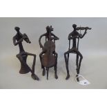 In the manner of Giacometti - a series of three painted bronze sculptures, featuring seated jazz