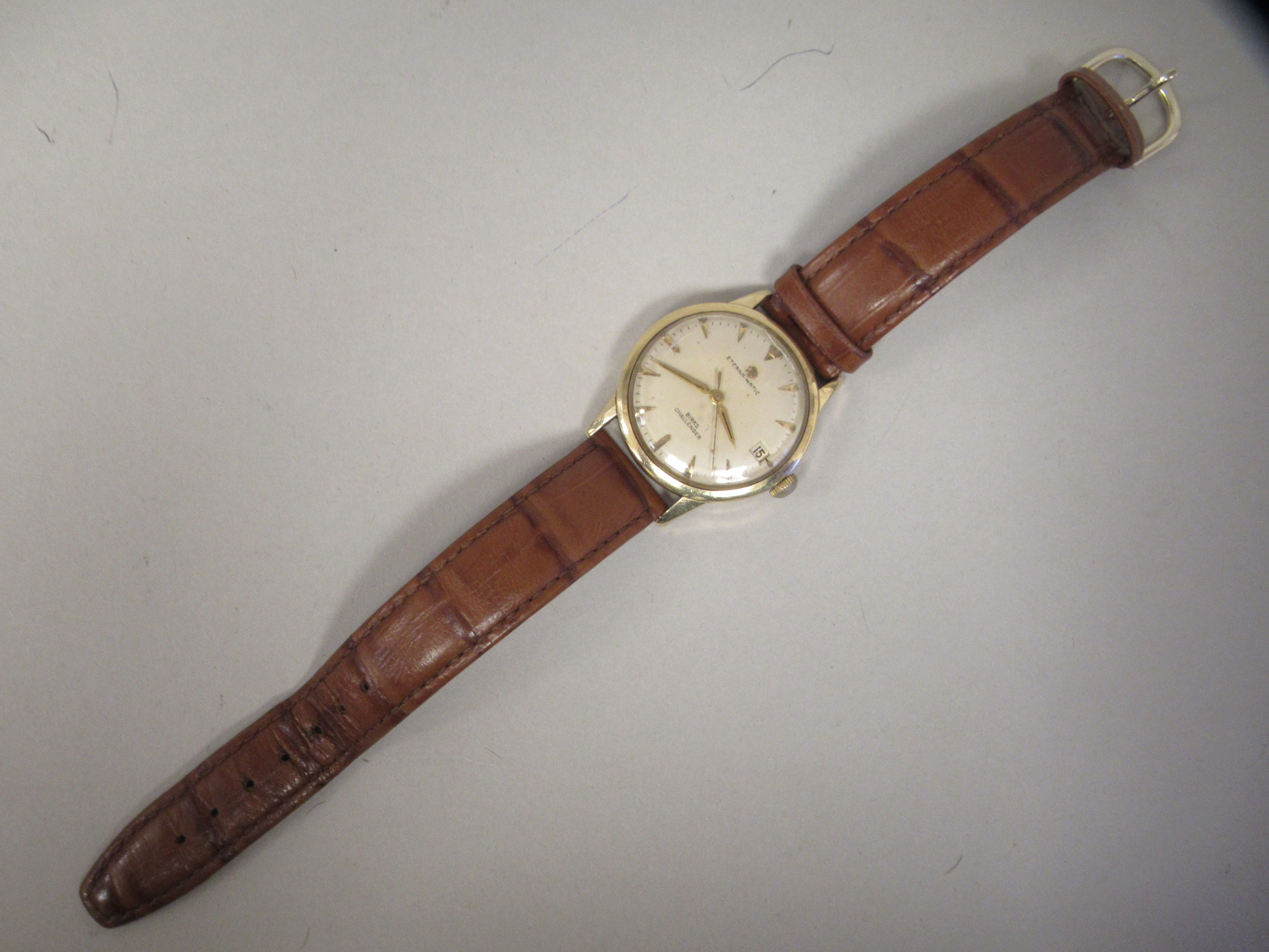 A 9ct gold cased Eterna-Matic wristwatch, the movement inscribed Birks Challenger, faced by a baton - Image 2 of 3