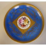 A 19thC Serves porcelain plate, decorated in sponged blue, mixed flora and painted in gilt  12"dia