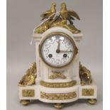 An early 20thC French mottled grey onyx and decoratively cast gilt metal mounted mantel clock with