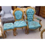 Three similar mid 20thC gilded balloon back nursing chairs, each with a blue fabric upholstered back