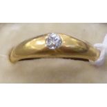 An 18ct gold single stone, rubover set diamond ring
