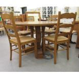 A modern 19thC style bespoke, light oak, tip-top breakfast table of planked and dowelled