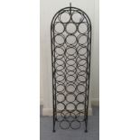 A modern wrought iron wine rack with provision for thirty one bottles  48"h  13"w