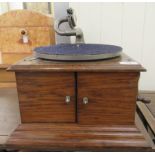 A modern replica of an oak cased table-top gramophone of box design with the soundbox enclosed by