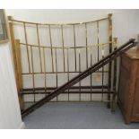 A late Victorian lacquered, square section brass bed frame with steel side rails  54"w