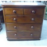 A late Victorian mahogany chest of two short/three long drawers with bun handles  38"h  40"w