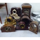 Miscellaneous 19th and 20thC mantel clock cases: to include one, decoratively cast and gilded