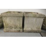 A pair of composition stone planters of box design with fluted ornament  18"h