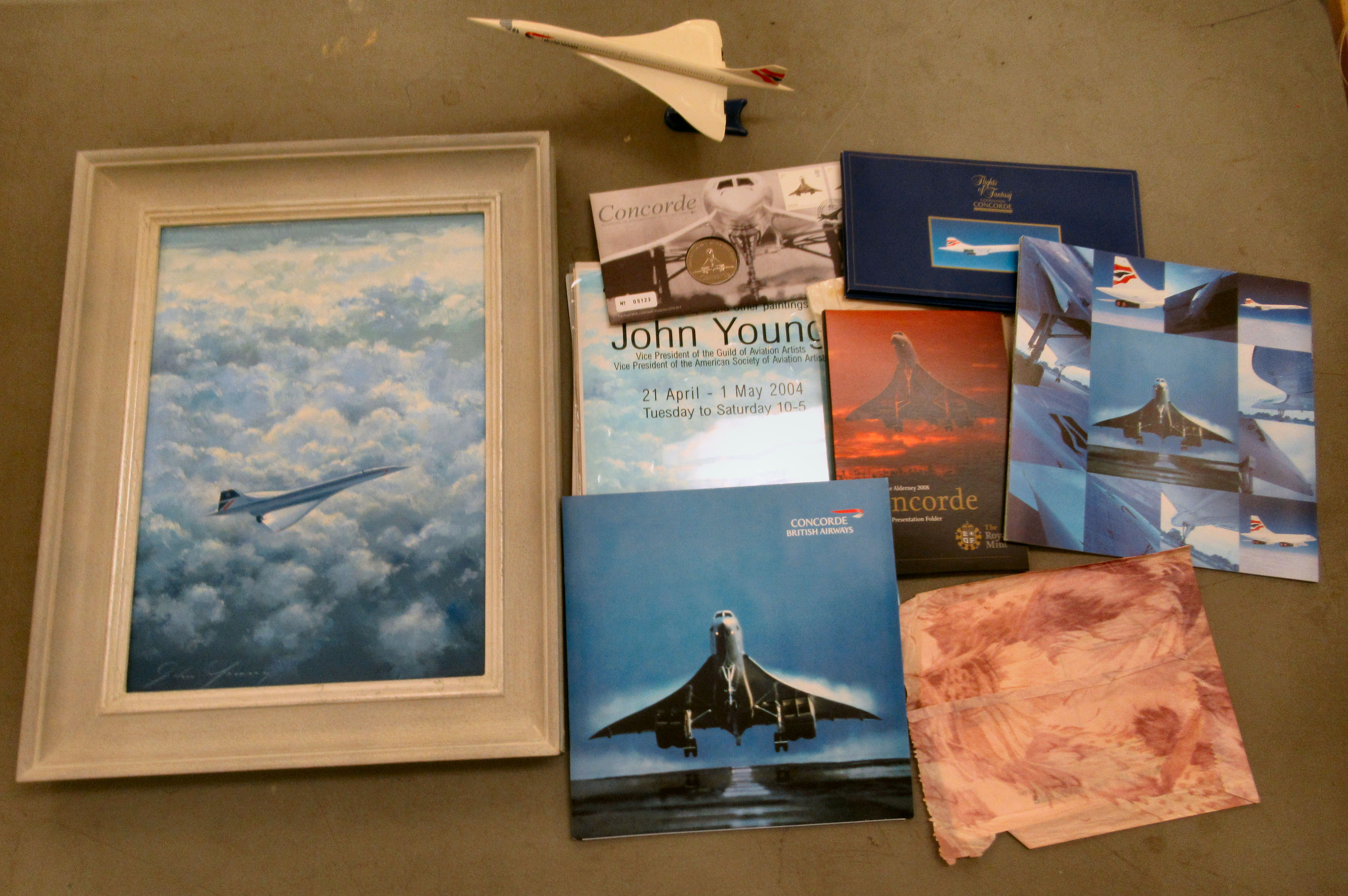 John Young - a Concorde flight  oil on board  bears a signature  9" x 13"  framed; and other