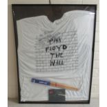 A Pink Floyd framed tribute  comprising a T-shirt bearing a David Gilmour signature; two