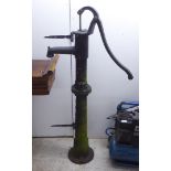 A Victorian style cast iron water pump head  52"h