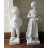 Two composition marble figures, viz. a boy smoking a pipe  15"h; and a Dutch girl  16.5"h