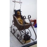 Dolls and accessories: to include a sleigh design wrought iron and woven split cane pram
