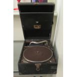 An HMV portable wind-up gramophone