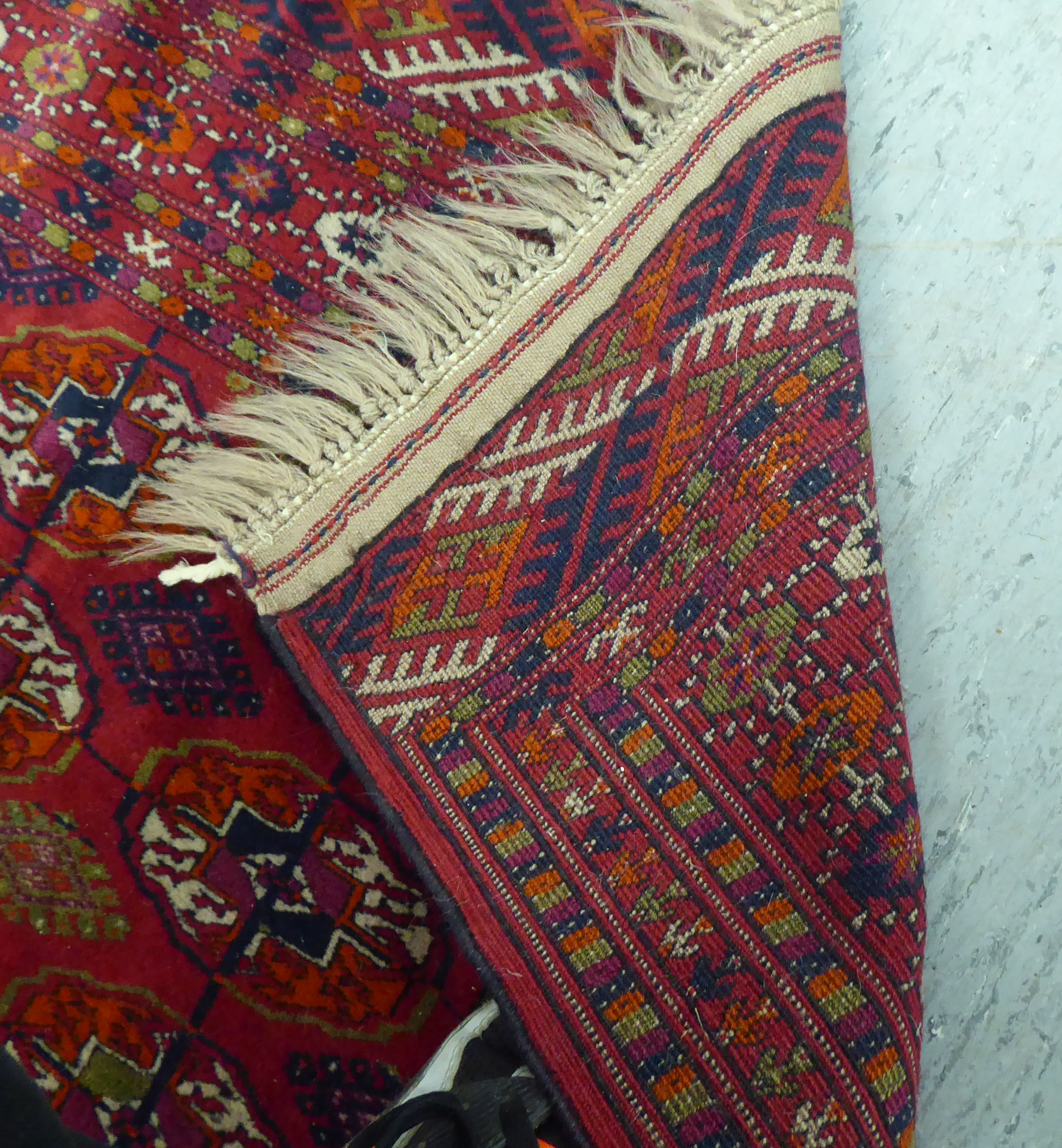 A Turkoman rug  39" x 58"; and another similar  46" x 66" each on a red ground - Image 5 of 5