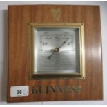 A modern mahogany framed barometer, branded for Guinness, faced by a steel dial  9"sq