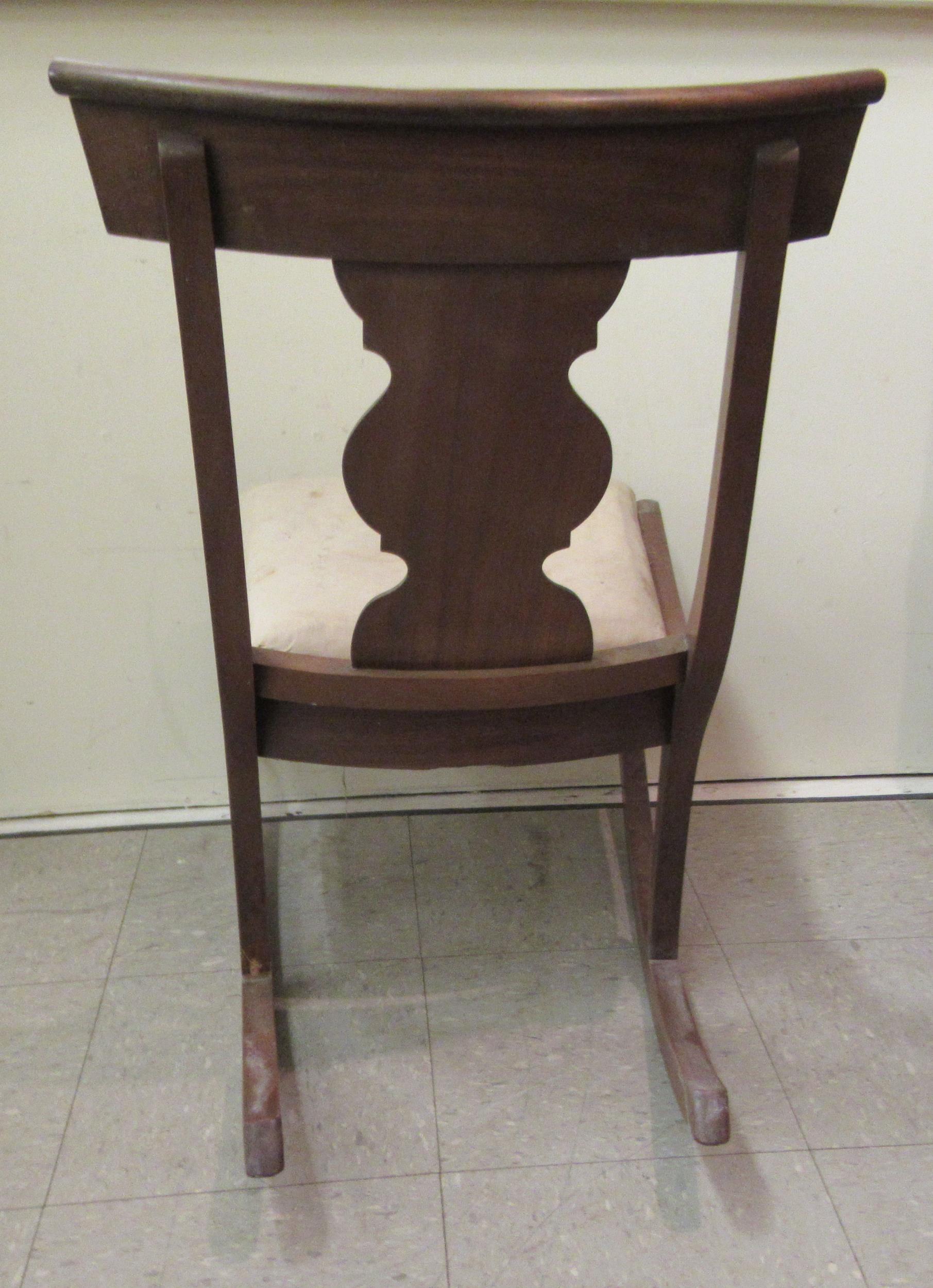 A 19thC and later mahogany framed rocking chair with a curved bar crest and vase design splat, the - Image 4 of 4