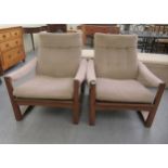 A pair of 1960s/1970s Guy Rogers teak framed and cushion upholstered, open arm easy chairs