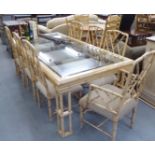 A modern bamboo effect dining table with a glass top, raised on cluster legs  30"h  86"L; and a