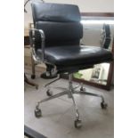 A modern retro design, chromium plated swivel desk chair with stitched black hide upholstered,