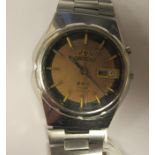 A vintage Orient Crystal automatic stainless steel cased bracelet watch, faced by a black and gilt