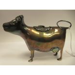 A John Schuppo design silver cow creamer  London 1974  4"h