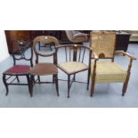 Four dissimilar early 20thC side chairs: to include an Art Nouveau mahogany framed, round back