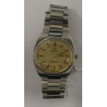 A vintage Omega Seamaster automatic stainless steel cased bracelet watch, faced by a gilt baton dial