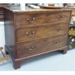 A 19thC mahogany dressing chest, comprising three graduated long drawers with brass bail handles,