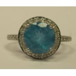 A 14ct white gold blue stone cluster ring