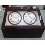 A walnut finished watch storage case  7"h  12.5"w  9"deep