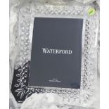 A Waterford Crystal photograph frame  5" x 7"  boxed