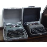 A vintage Remington Rand portable typewriter; and an Olympia