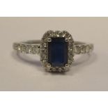A white gold sapphire and diamond ring