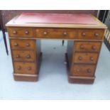 A late Victorian mahogany, nine drawer, twin pedestal desk, on a plinth  30"h  42"w