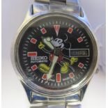 A vintage Seiko 5 automatic, novelty Mickey Mouse stainless steel cased bracelet watch, faced by a