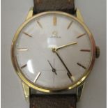 A 1960s Omega gold plated cased, manual wristwatch, the movement no.21595619, faced by a baton dial,