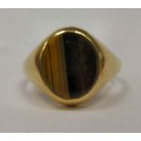 A 9ct gold signet ring, set with tigers eye