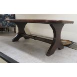 A modern mahogany framed coffee table, the top set with a pictorial hide top, signed David & dated