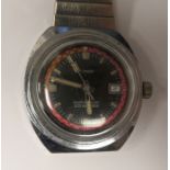 A vintage Times automatic stainless steel cased divers watch, faced by a baton dial with a date