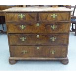 A George III walnut veneered, five drawer dressing chest, raised on bracket feet  33"h  37"w