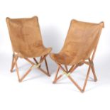 After Joseph Fendi for Paolo Vigano: a pair of 'Tripolina' style leather sling chairs.