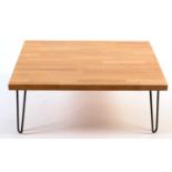 Bieffe: a modern light oak coffee table.