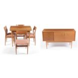 Uniflex: a mid Century teak six-piece dining room suite.